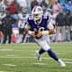 Bills quarterback Mitch Trubisky rolls to his right and scores in the fourth quarter against Houston.